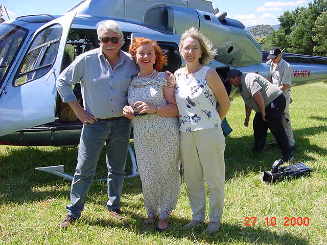 Photo: (left) Gary Ticehurst, ABC TV News Pilot, (centre) Aniela Kos, (right) Aniela's Assistant Glenda | CLICK Video: ABC TV Australian National News Perceval Retrospective in Galeria Aniela, 2000